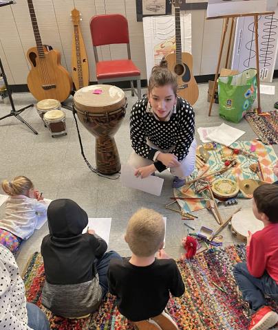 Musician with children